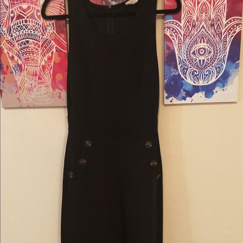 Black Jumpsuit with buttons. Short leg style.